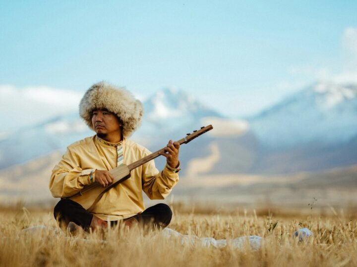 Komuz player, Kyrgyzstan