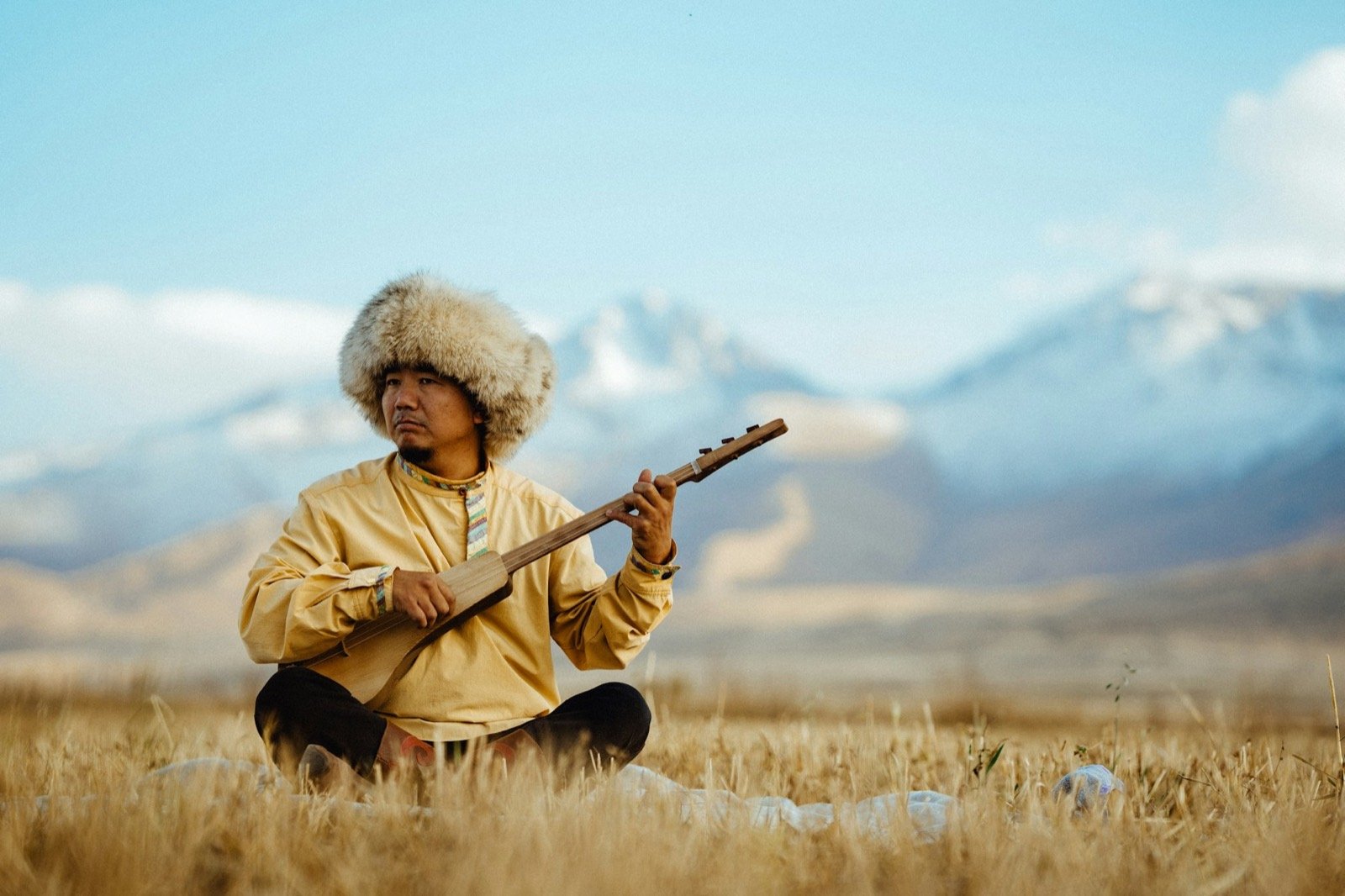 Komuz player, Kyrgyzstan